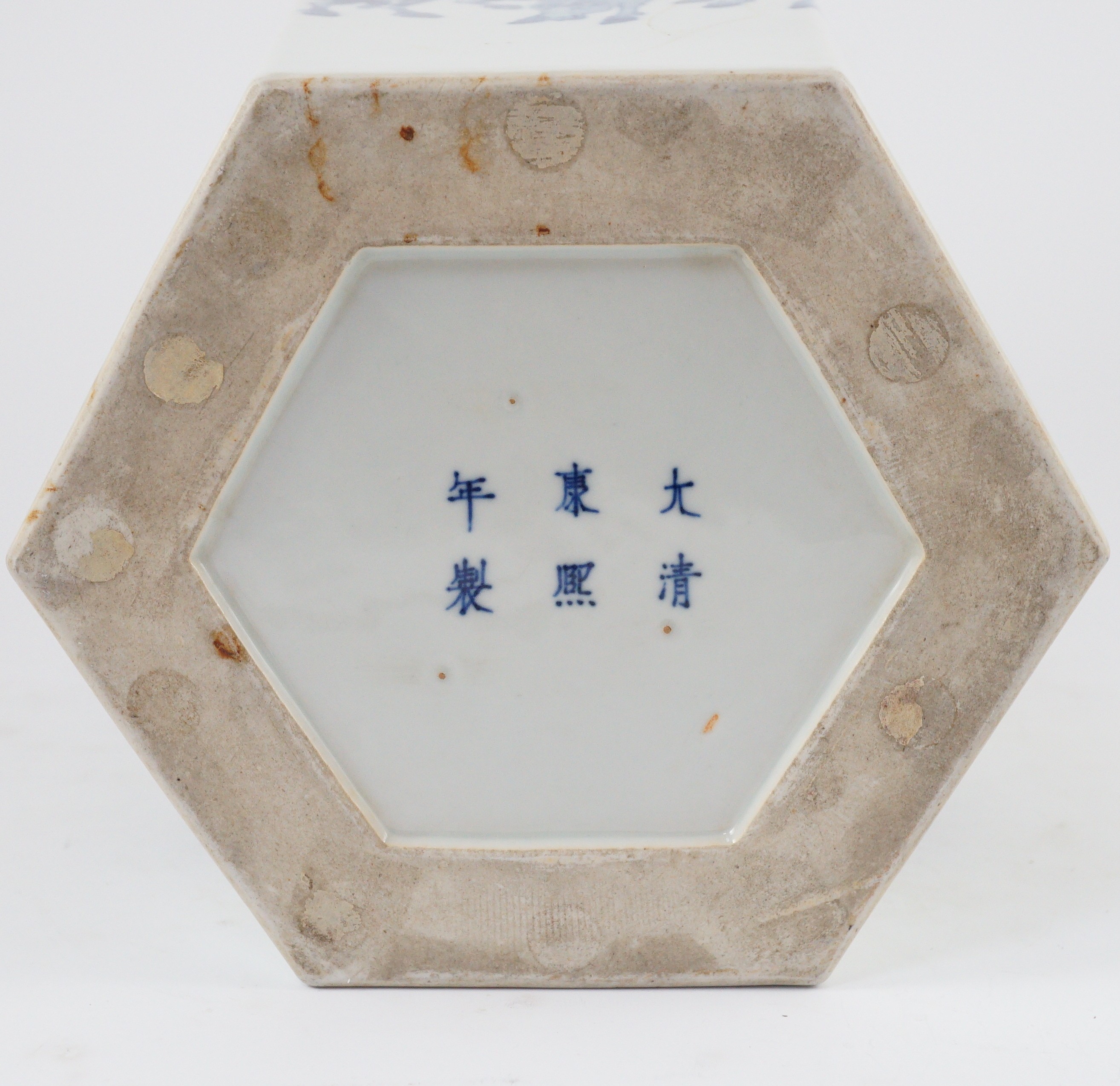 A Chinese blue and white hexagonal jardiniere, Kangxi mark but 19th/20th century, 26.5cm high, 28cm wide, cracked